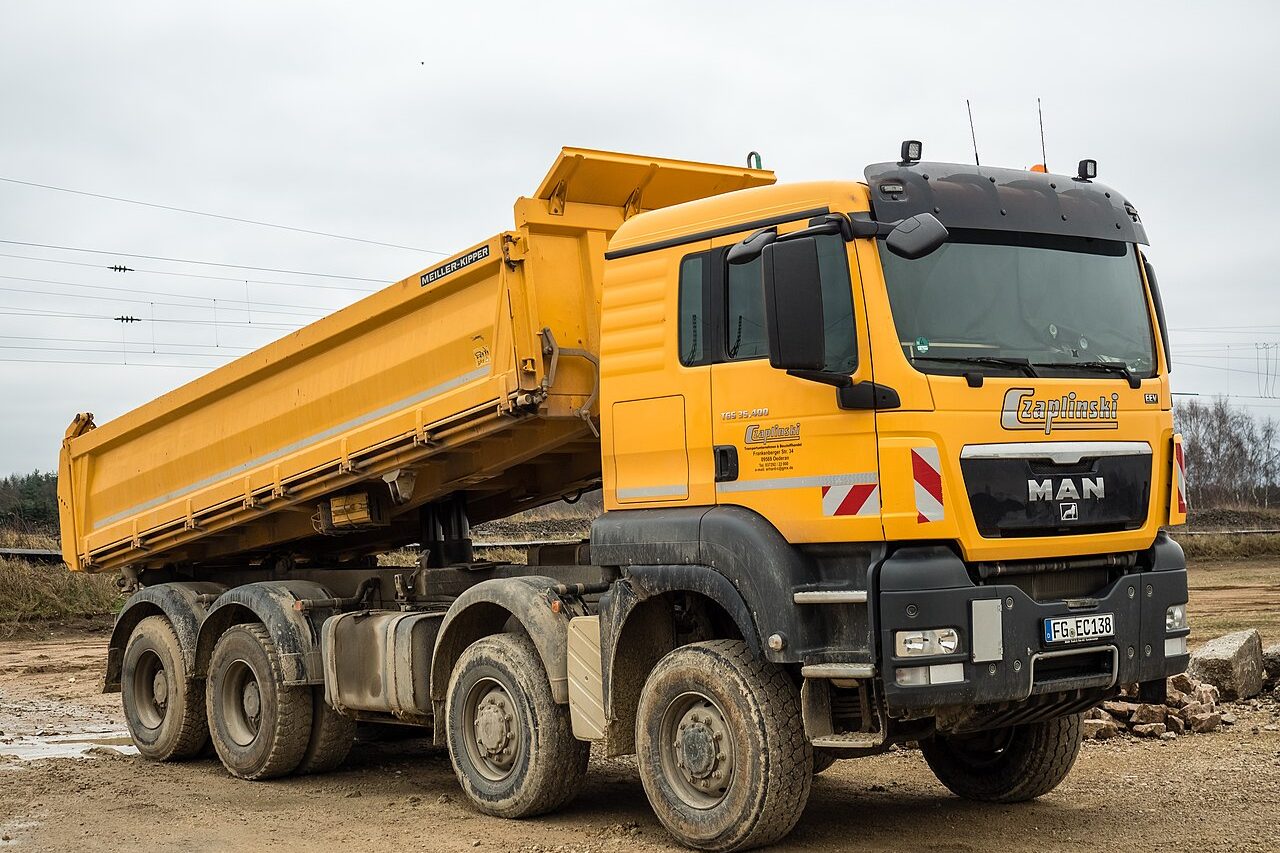 Eight-wheel tipper truck working on a construction site